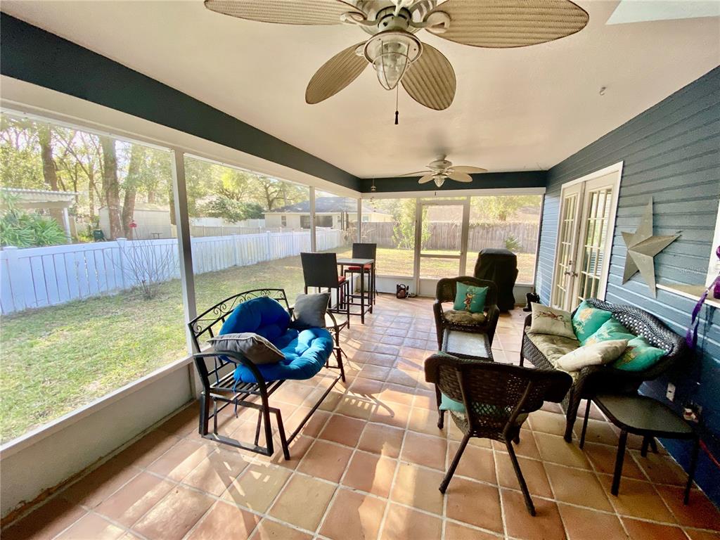 TILED FLOORS AND SCREENED IN LANAI