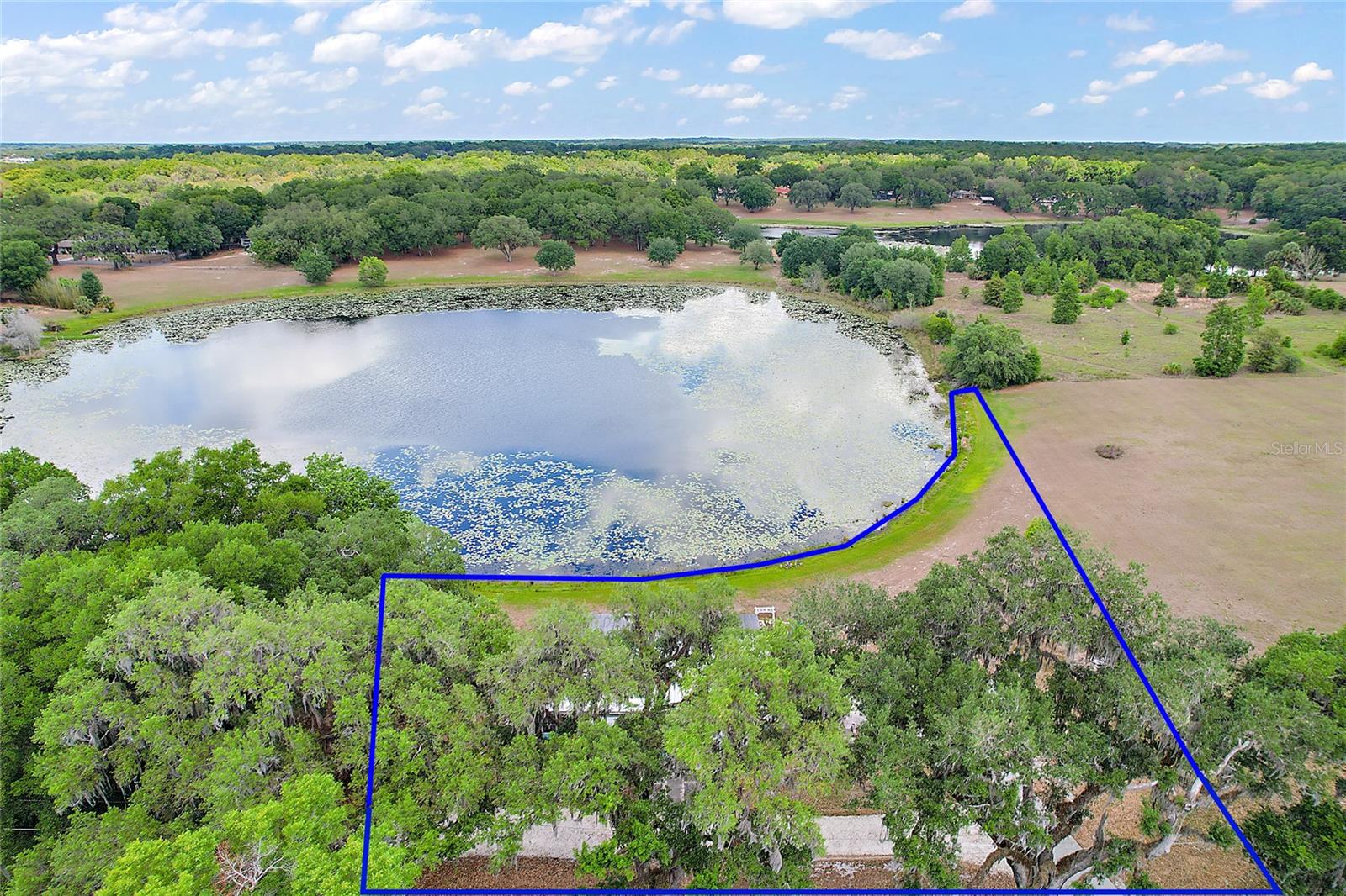 over 1.3 acres on Lake Hermosa