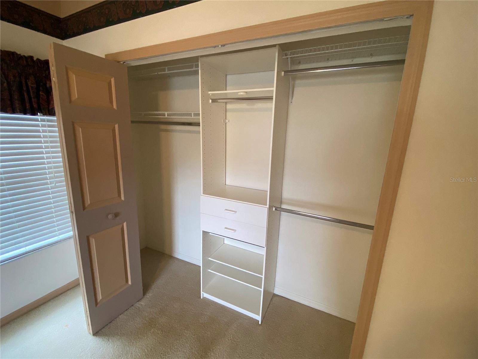CALIFORNIA CLOSET IN GUEST ROOM