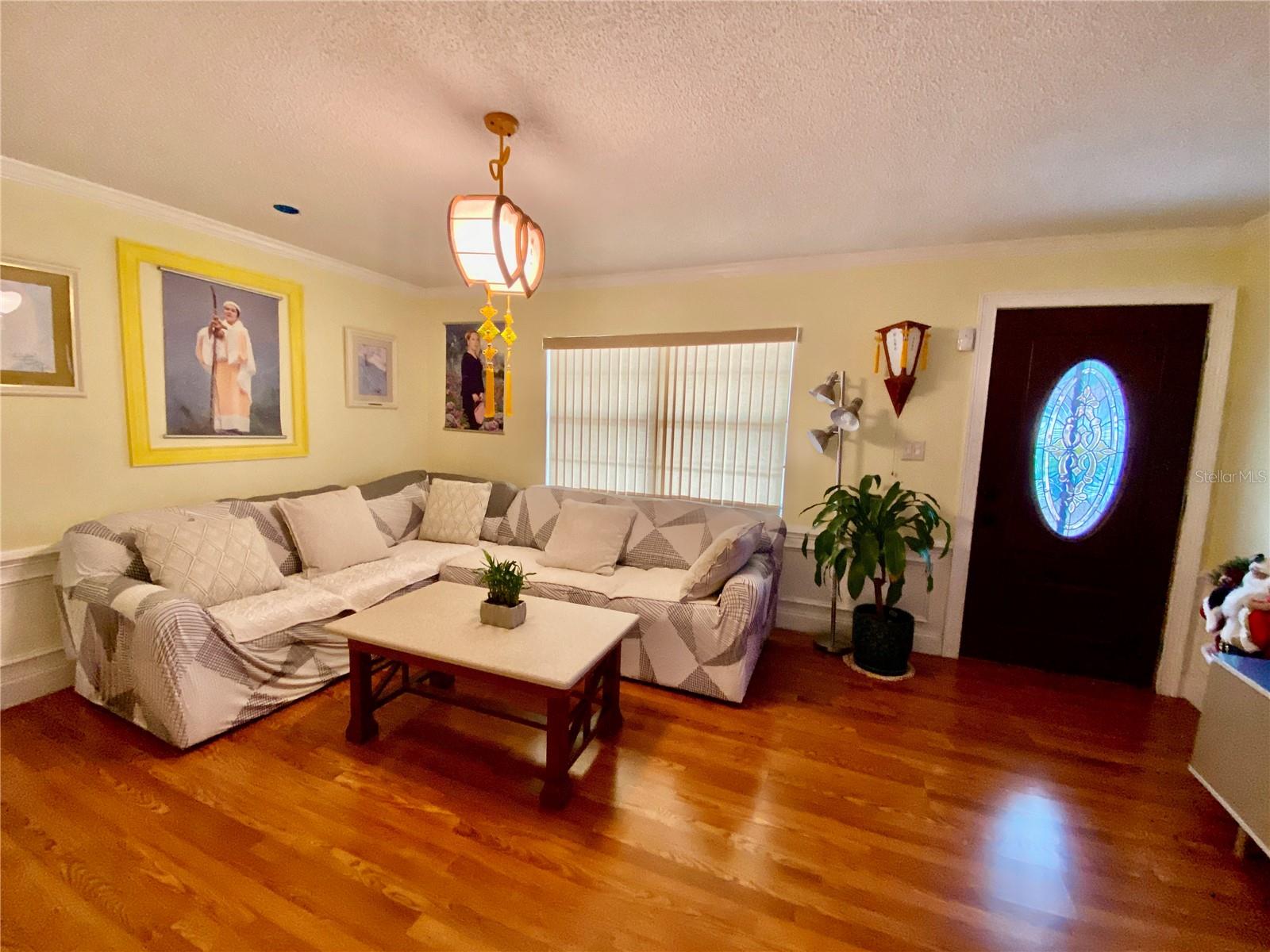 LIVING ROOM SHOWING LEADED GLASS FRONT DOOR