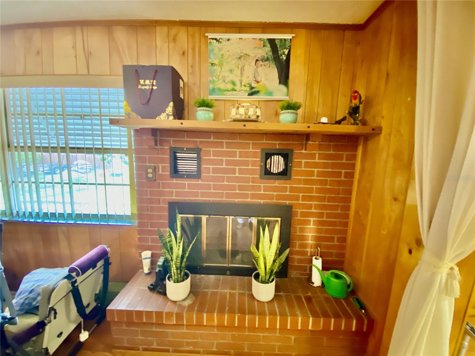 WOOD BURNING FIREPLACE IN FAMILY ROOM