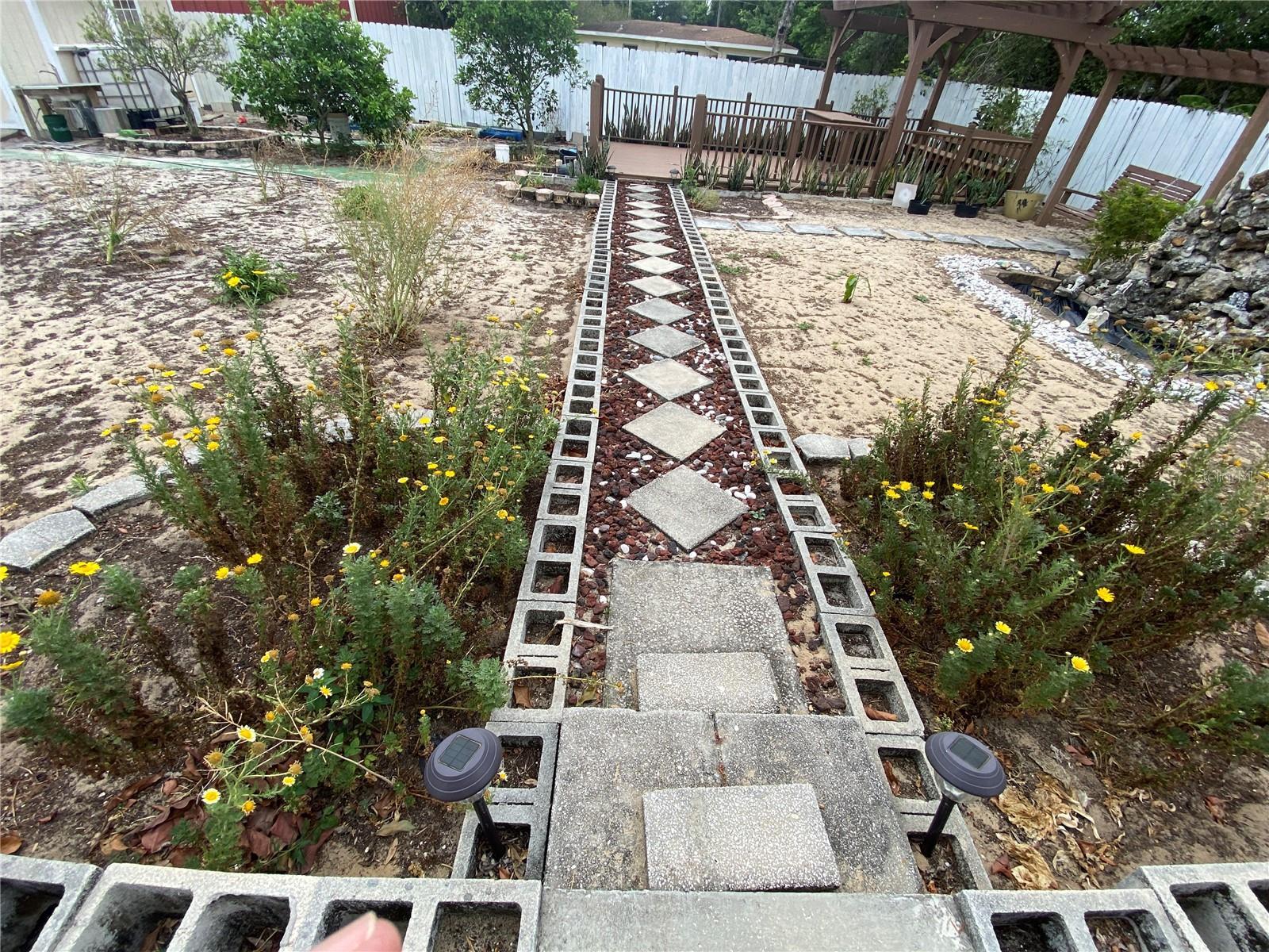 PATHWAYS THROUGHOUT BACK YARD