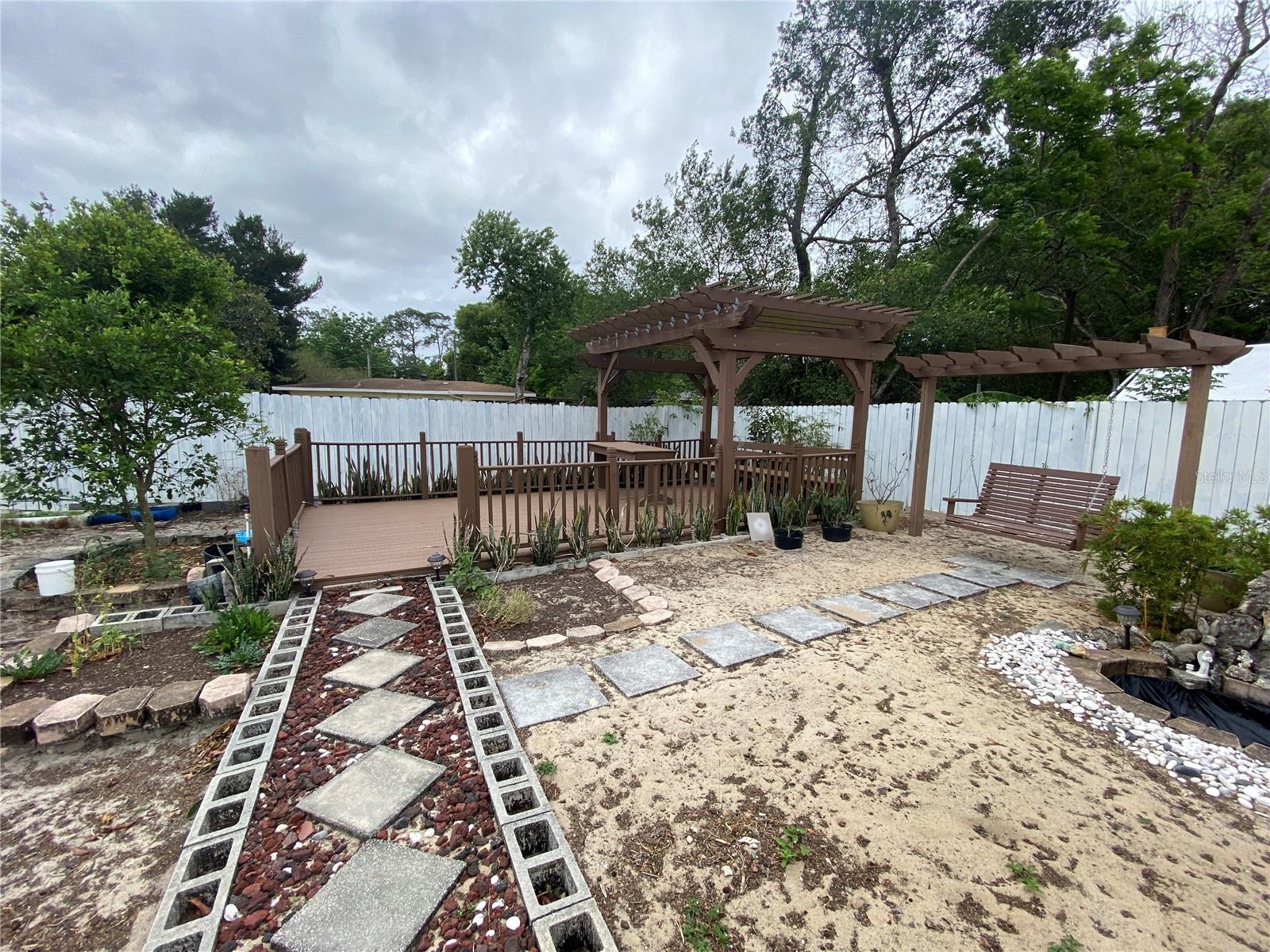 MORE PATHWAYS AND VINYL FENCING