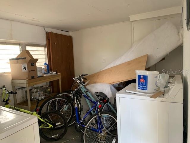 utility room next to garage