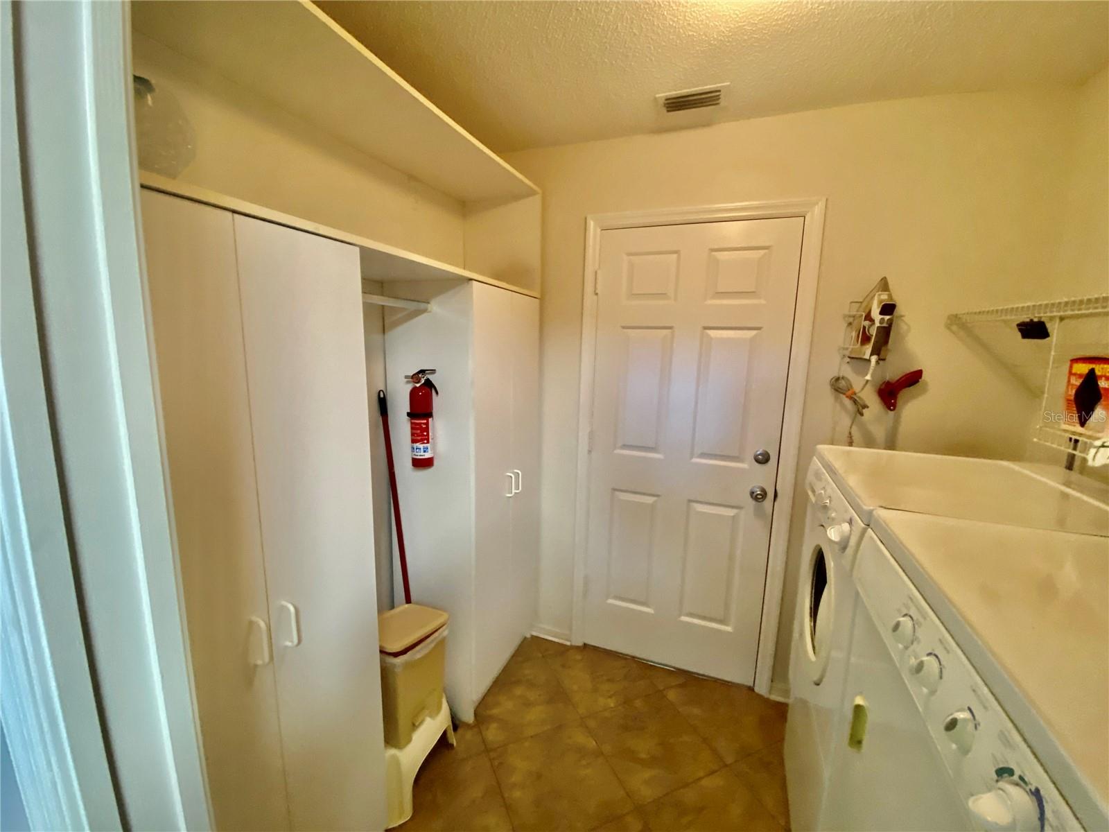 INSIDE UTILITY WITH ADDED STORAGE