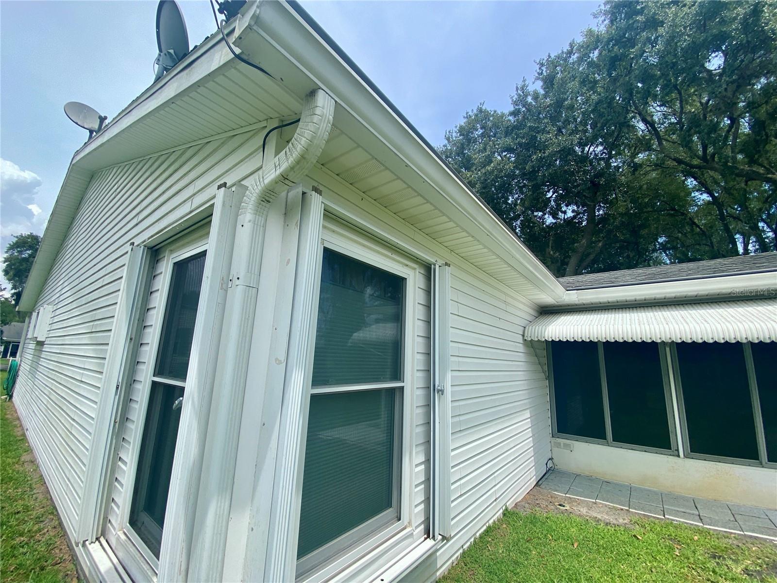 CUSTOM STORM SHUTTERS