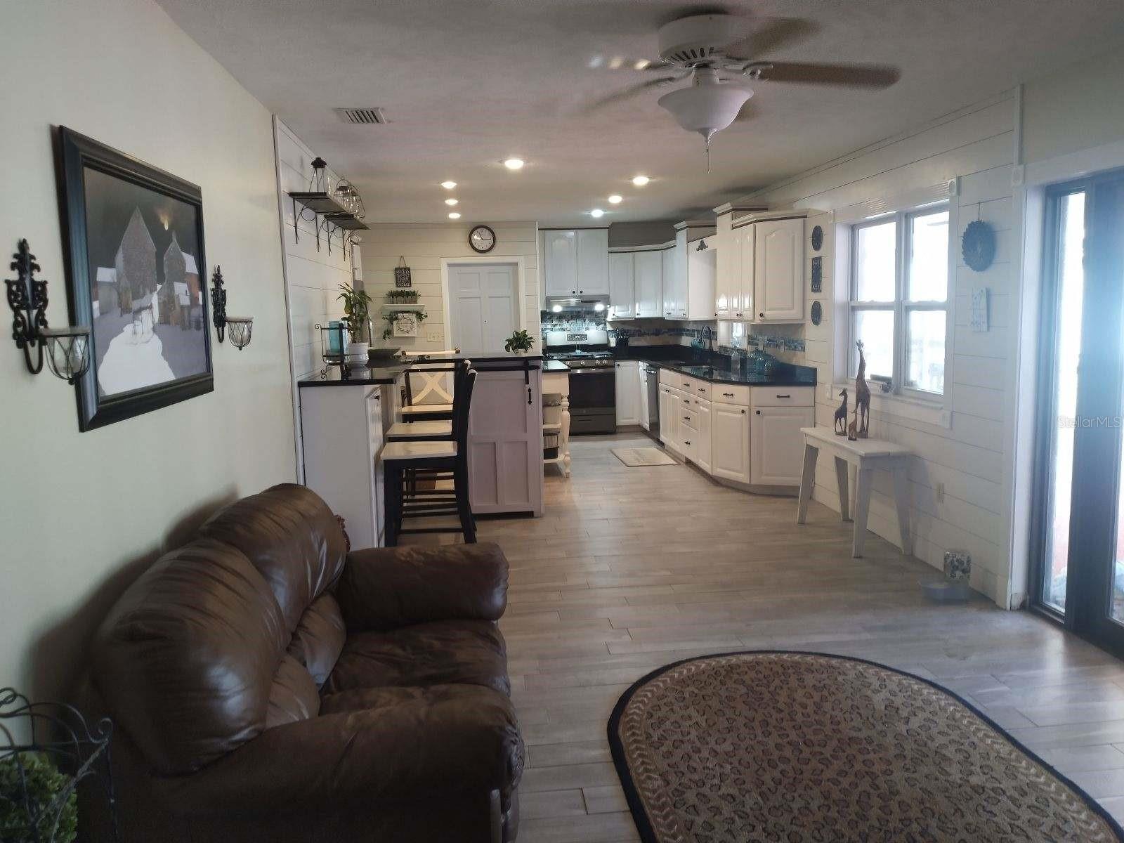 FAMILY ROOM LOOKING INTO KITCHEN
