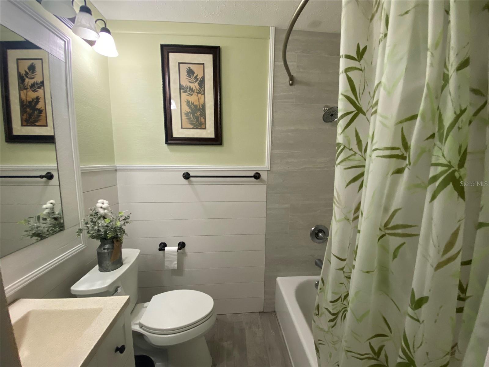 ONE OF THREE FULL BATHS