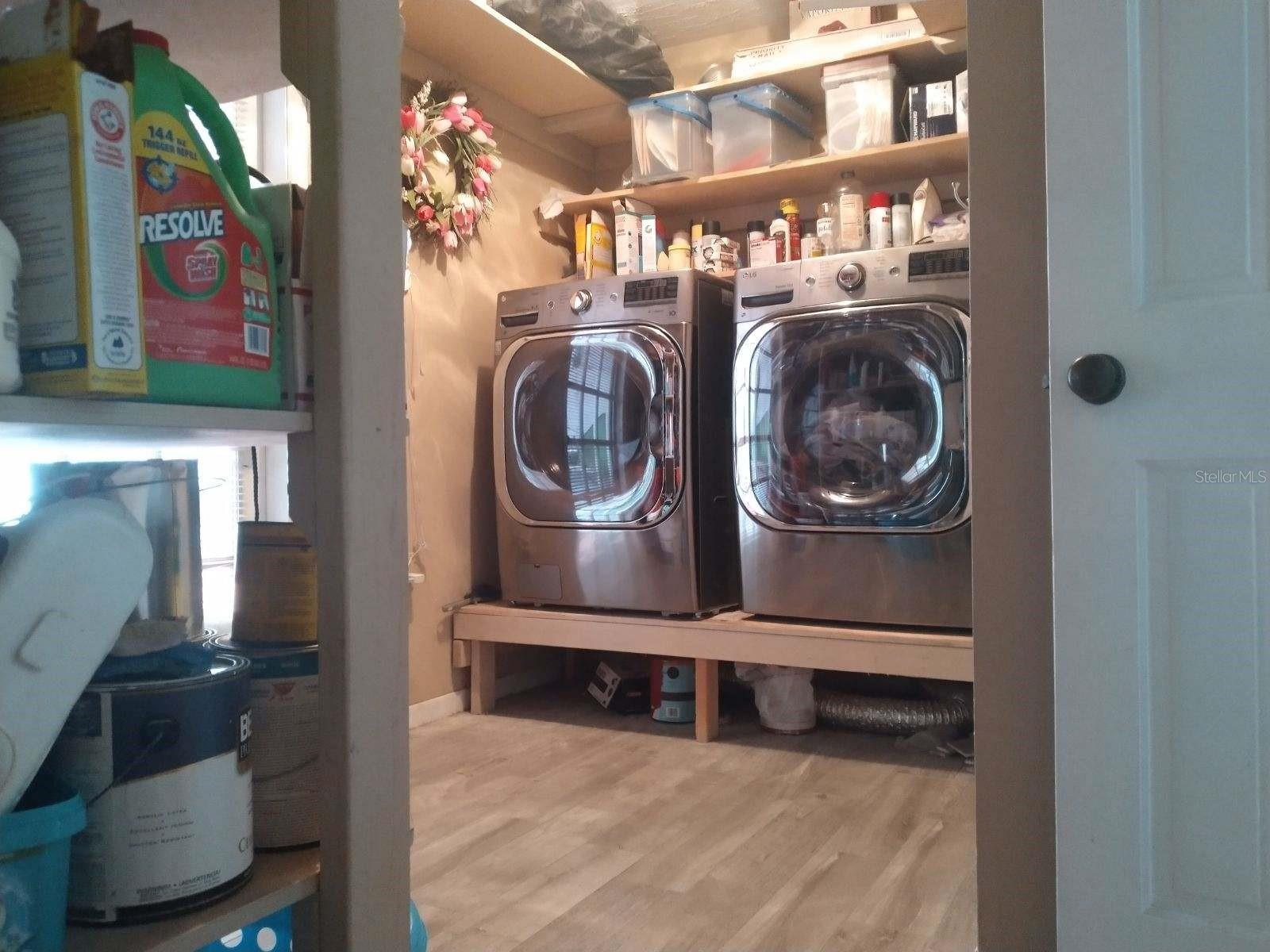 LARGE UTILITY ROOM WITH PORCELAIN TILE FLOORS