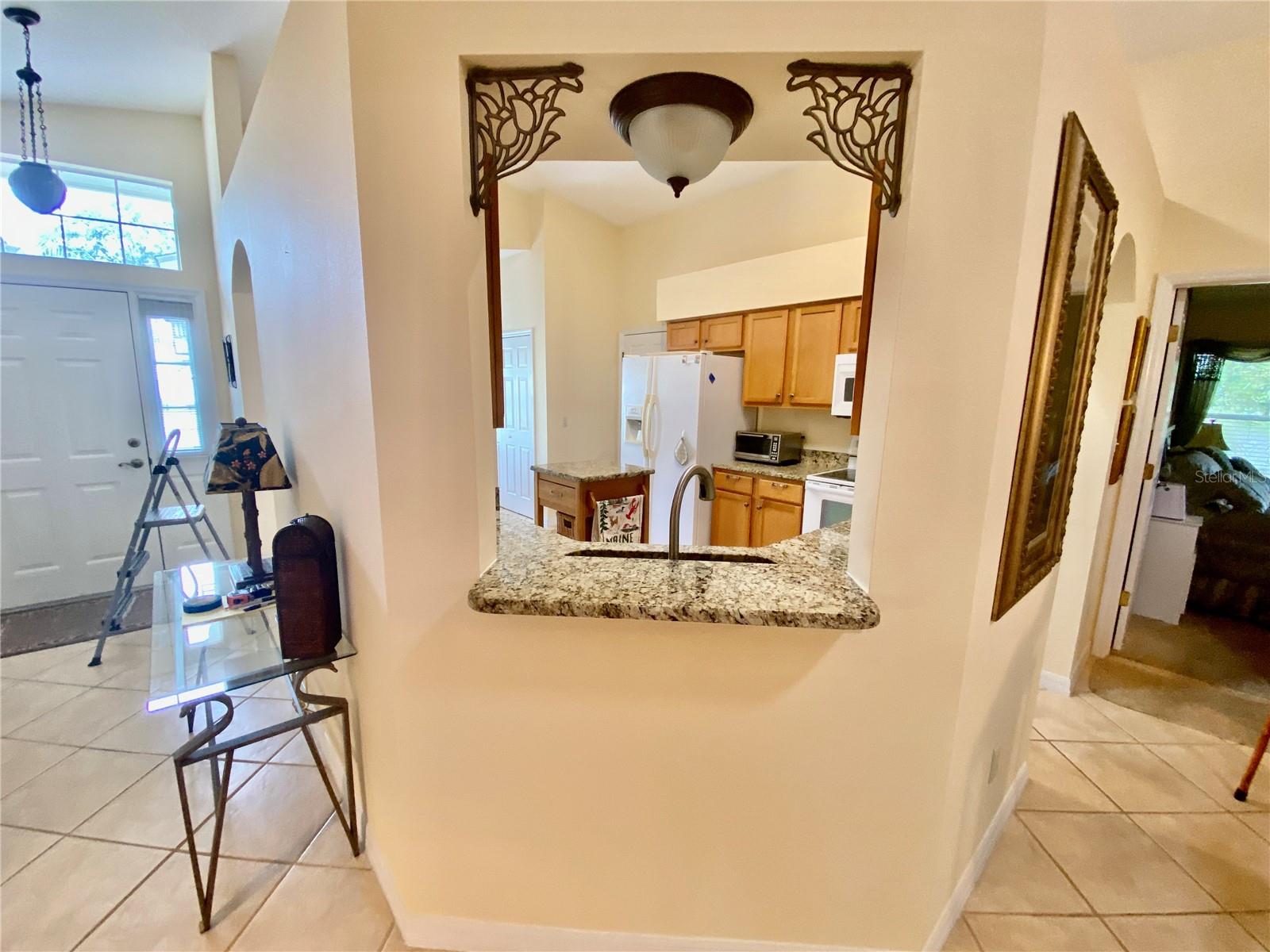 LOOKING INTO KITCHEN