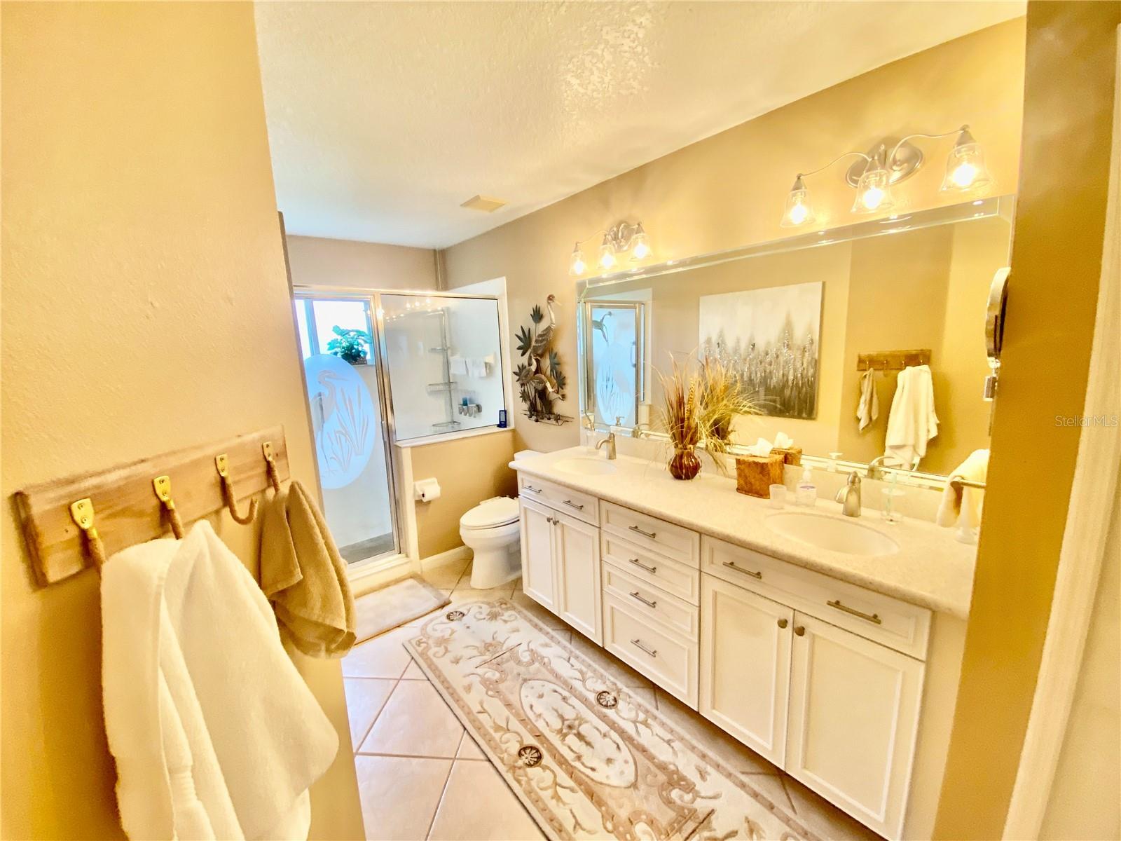 MASTER BATH WITH DOUBLE VANITIES, CORIAN COUNTERTOPS