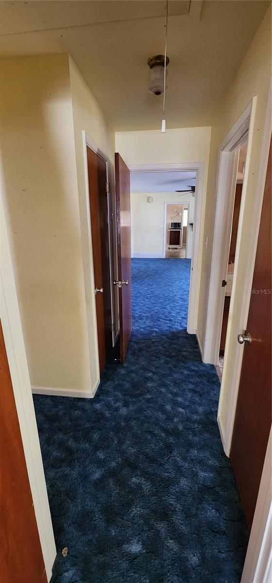 Hallway from bedrooms 2, 3 and bath