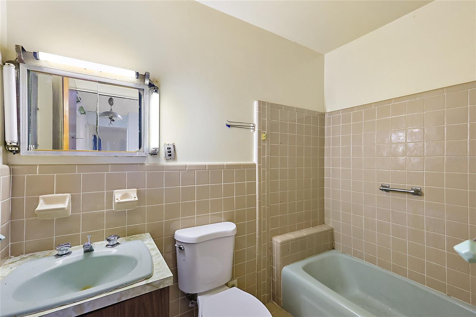 primary bathroom off kitchen