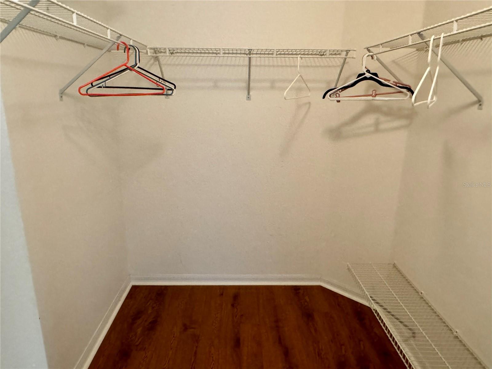 WALK IN CLOSET IN PRIMARY BEDROOM