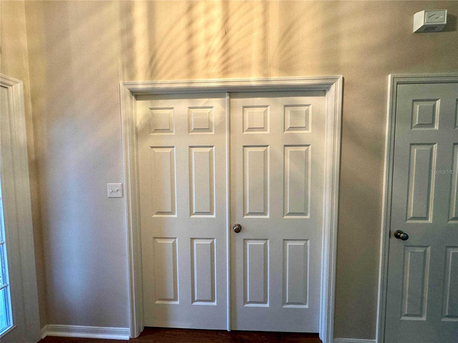 DOUBLE FRENCH DOORS DOORS LEADING INTO 3RD BEDROOM/DEN