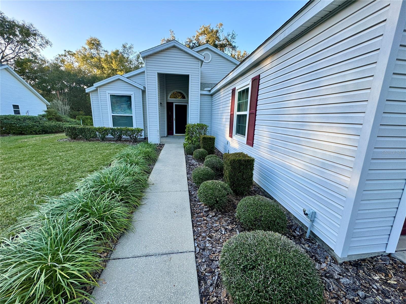 LANDSCAPING LEADING TO FRONT ENTRANCE