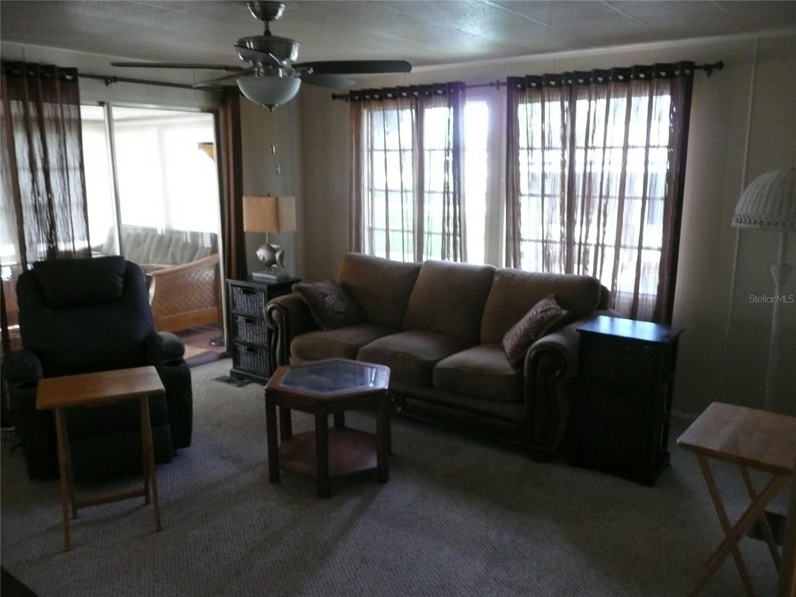 Sliding doors take you from Living Room to FL Room