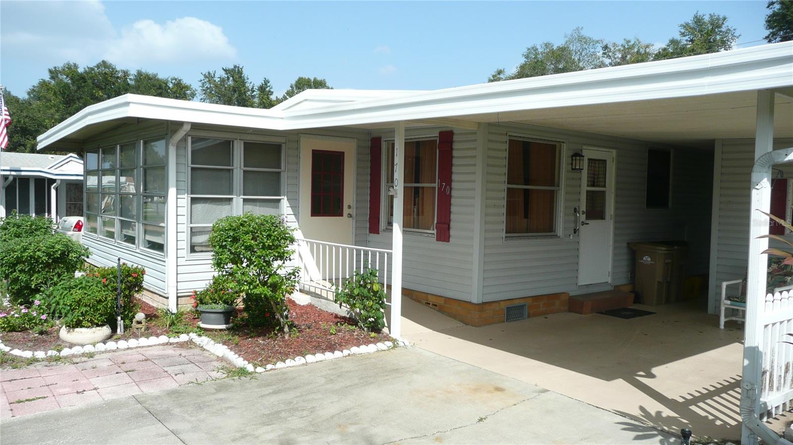Park in covered carport. Wheel up gentle ramp.