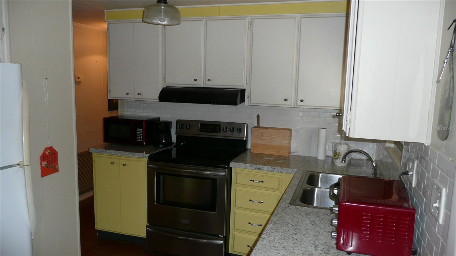 Electric Range, Microwave, Refrigerator, Toaster Oven