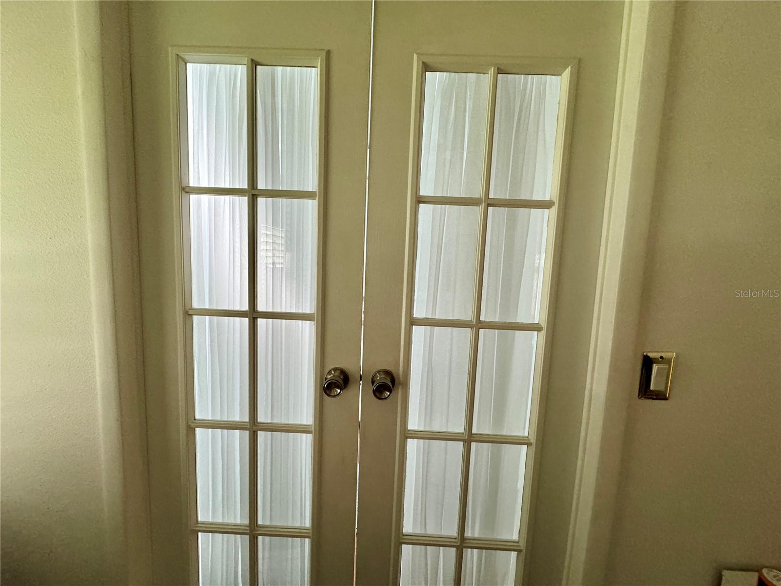 FRENCH DOORS GOING INTO PRIMARTY BATH