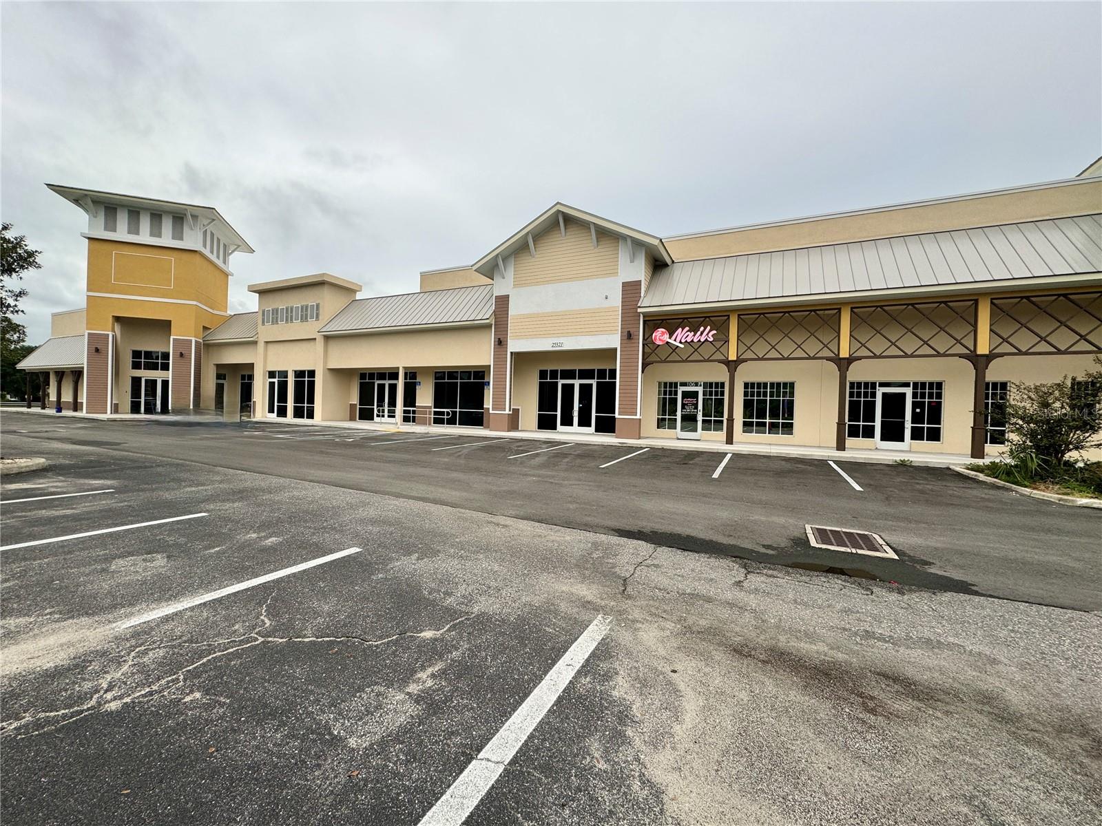 PORTIONS OF NEW PLAZA WITH PLACE OF WORSHIP, NAIL SALON PLUS ADDITIONAL STORE FRONTS