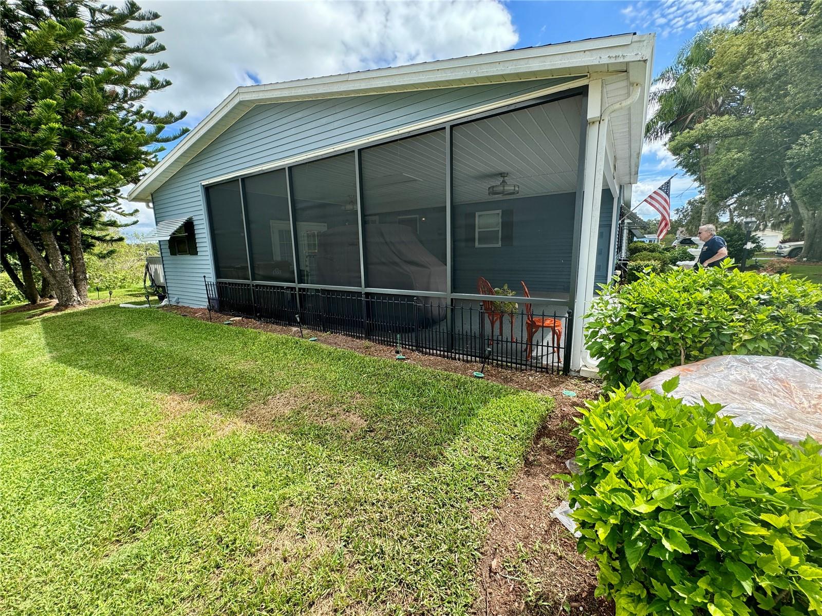 SCREENED WALL IN CARPORT