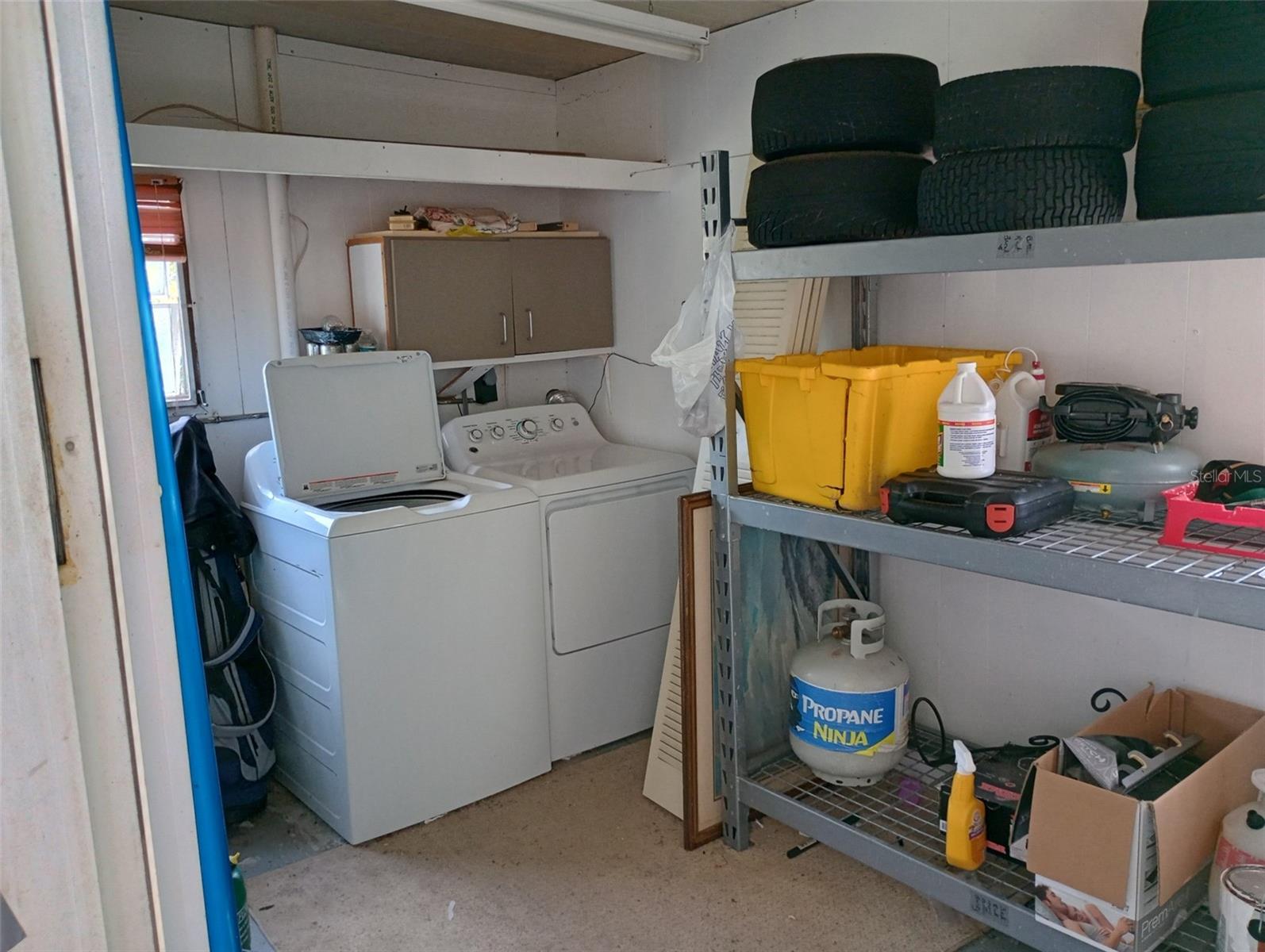 Washer and Dryer in oversized workshop