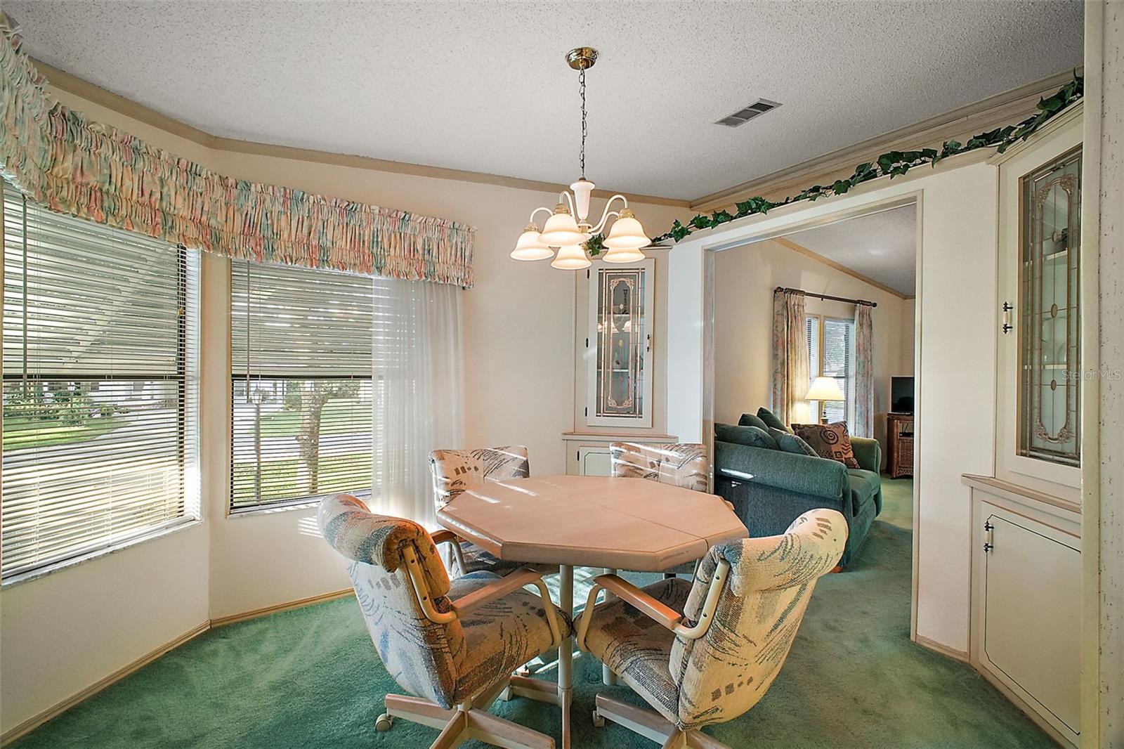 DINING AREA WITH LARGE WINDOWS