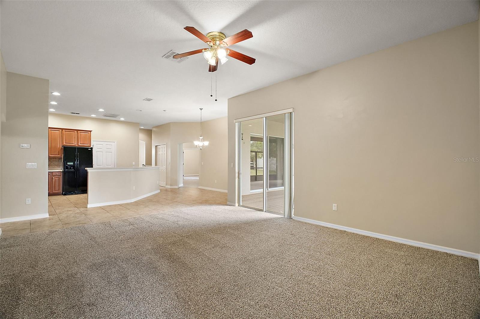 living room looking into kitchen and dinette