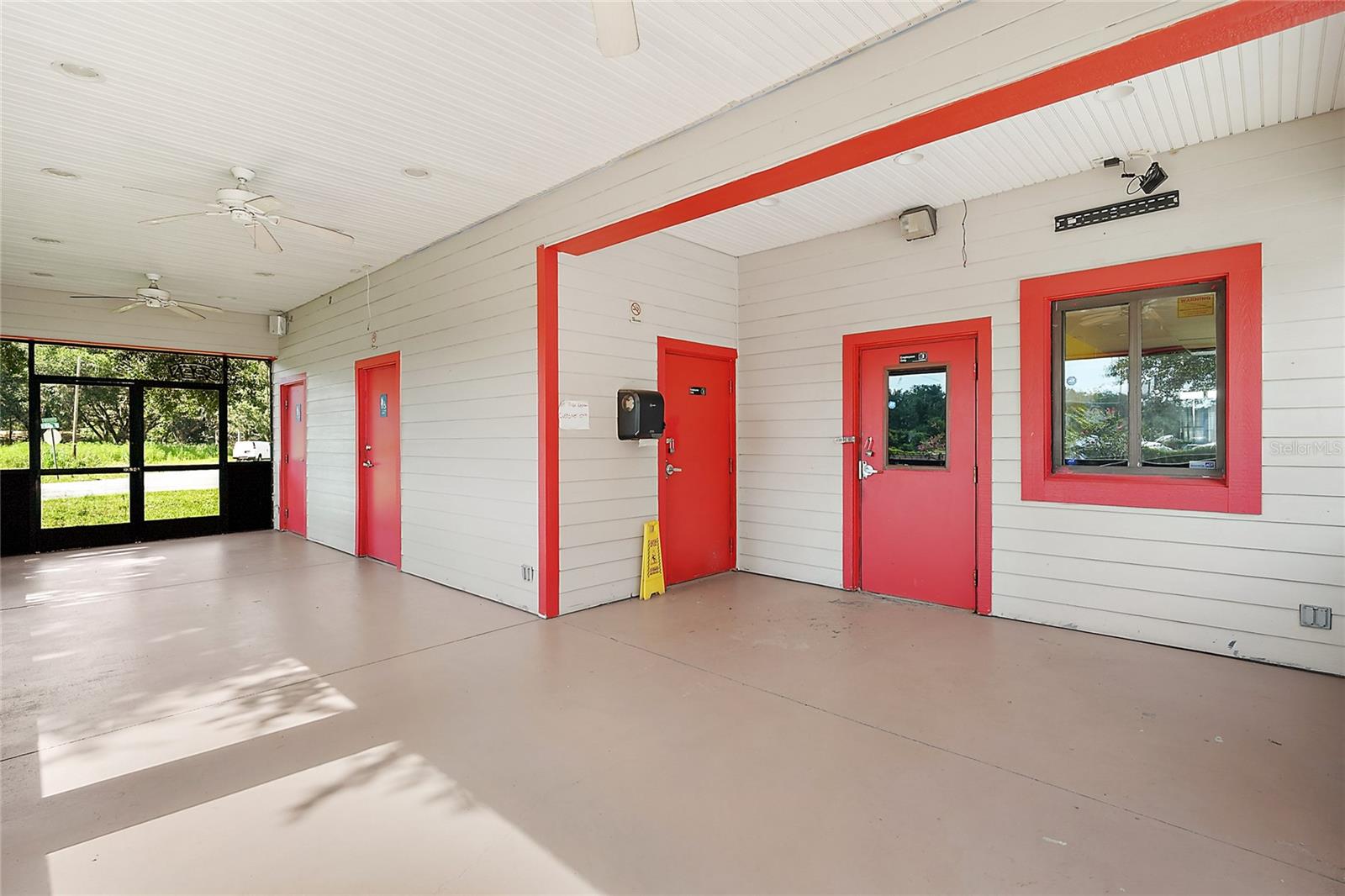 Kitchen Entrance / Employee and Guest Bathrooms / outdoor seating / pickup window