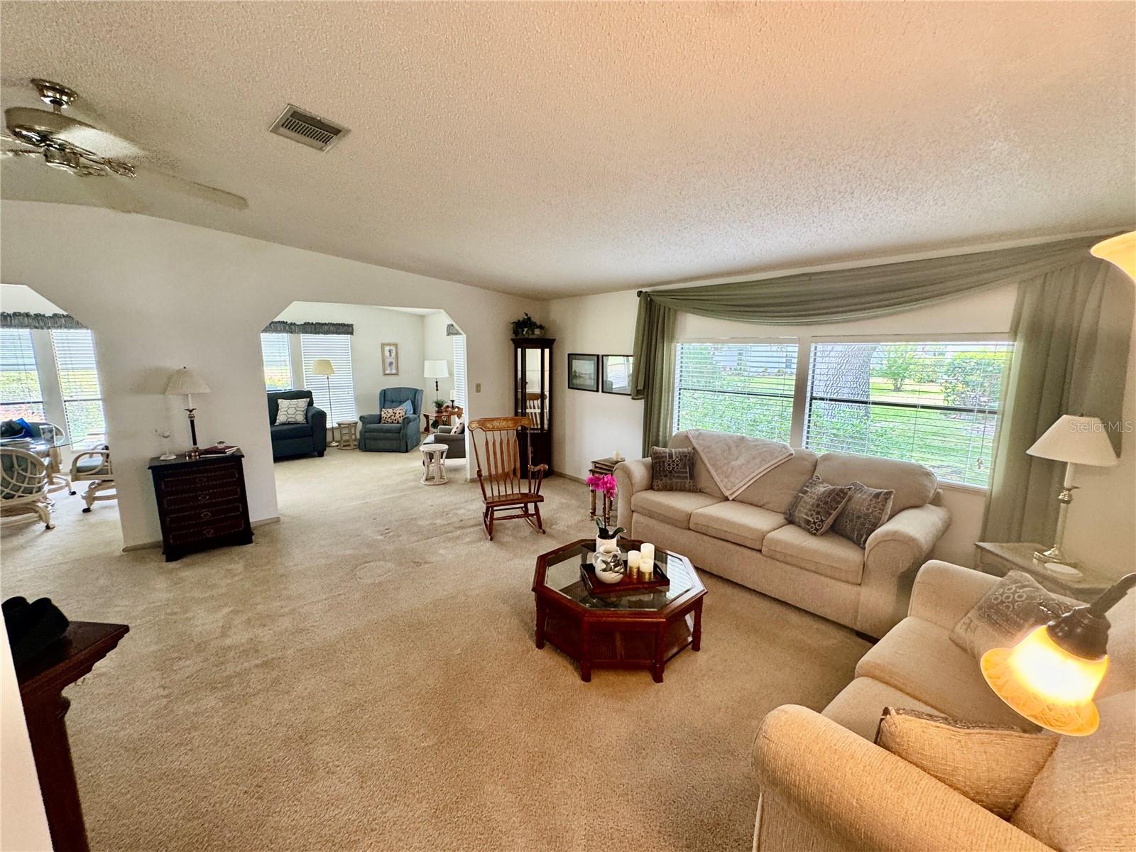 LIVING ROOM LOOKING INTO FLORIDA ROOM