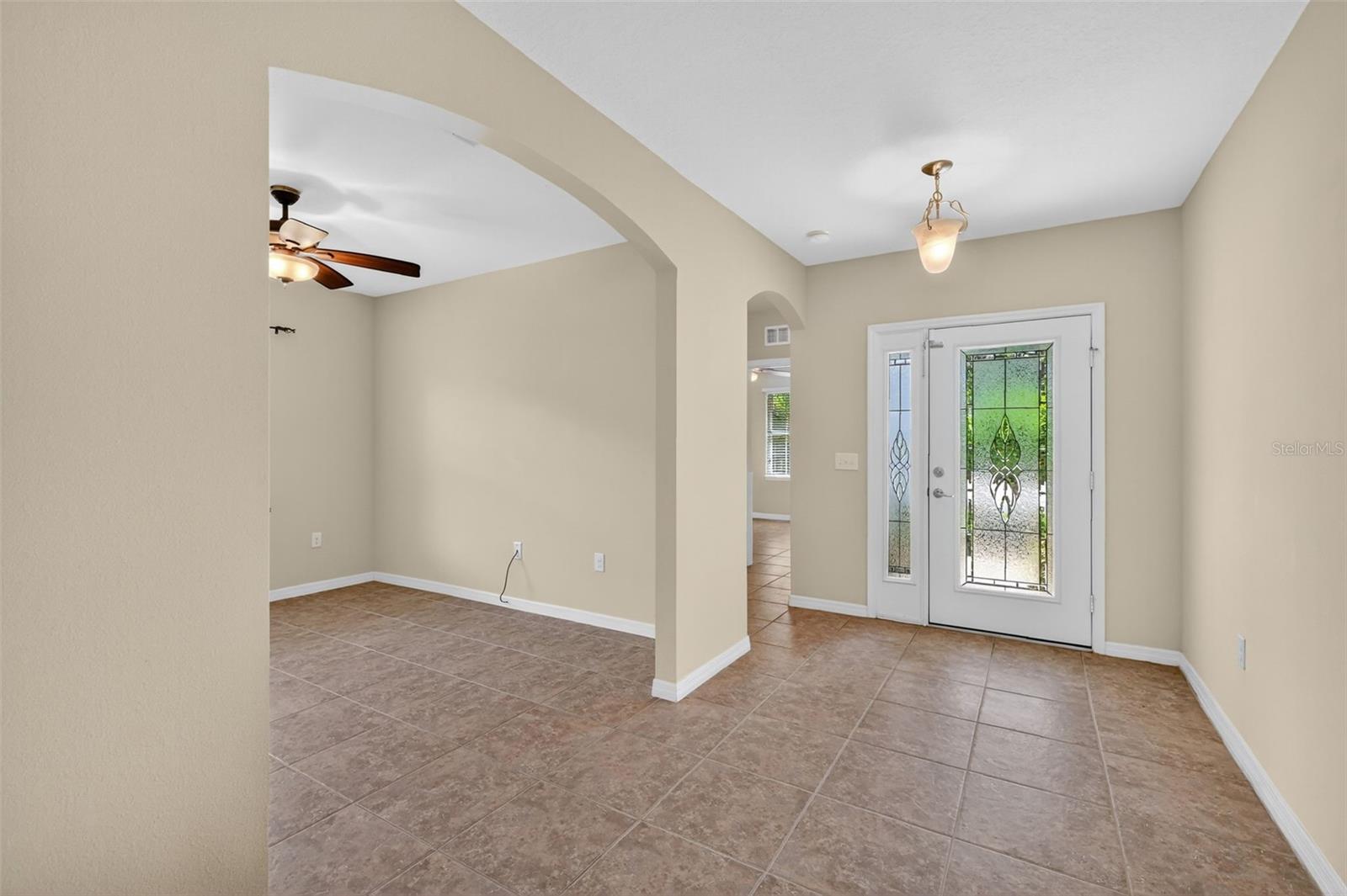 View of Front door and Den/Study