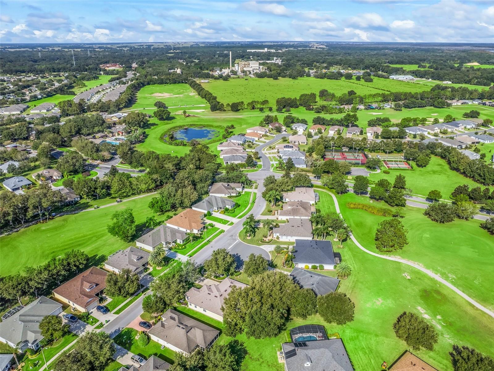 Drone view of Arlington Ridge Golf corse and homes.