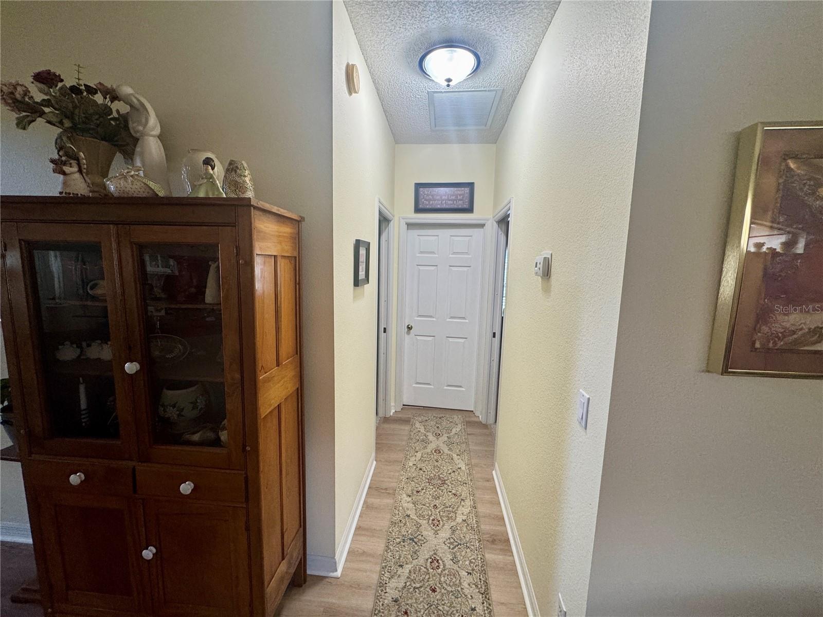 HALLWAY TO GUEST ROOMS