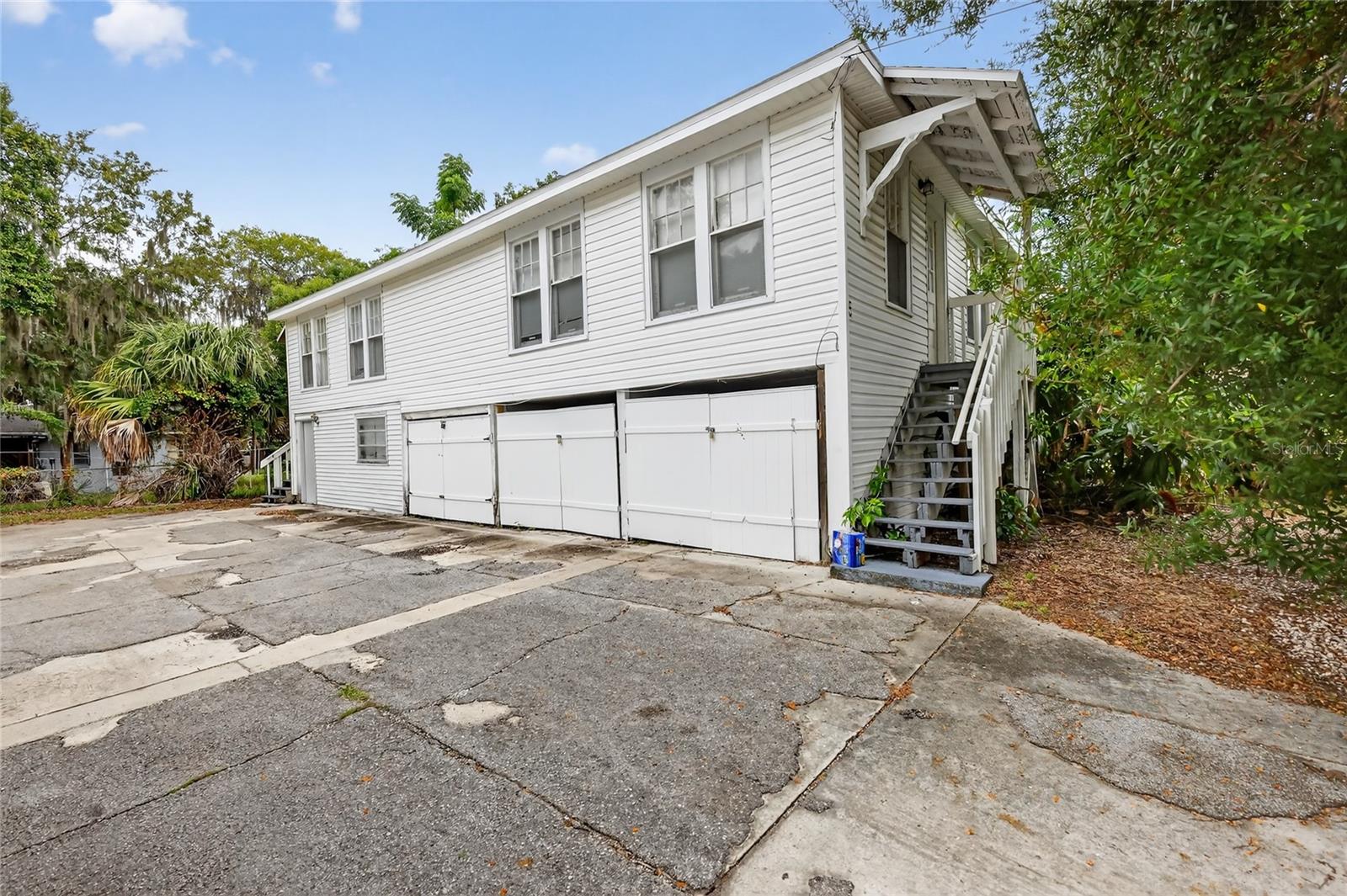 Carriage house 2 - 1/1s upstairs, 3 storage units below